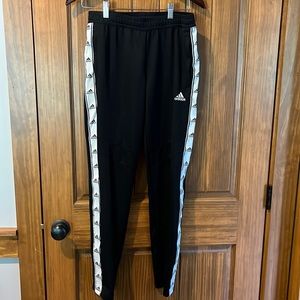 Black Adidas track pants